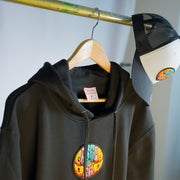 Grateful Dead hoodie by Drew Millward hanging on display, highlighting front graphic and relaxed fit