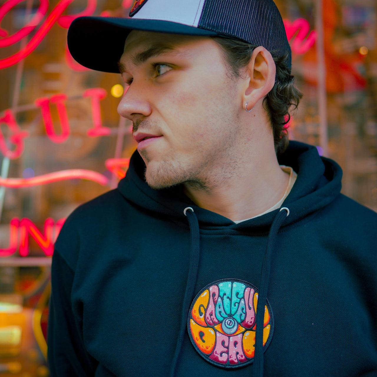 Model wearing Grateful Dead hoodie by Drew Millward front view
