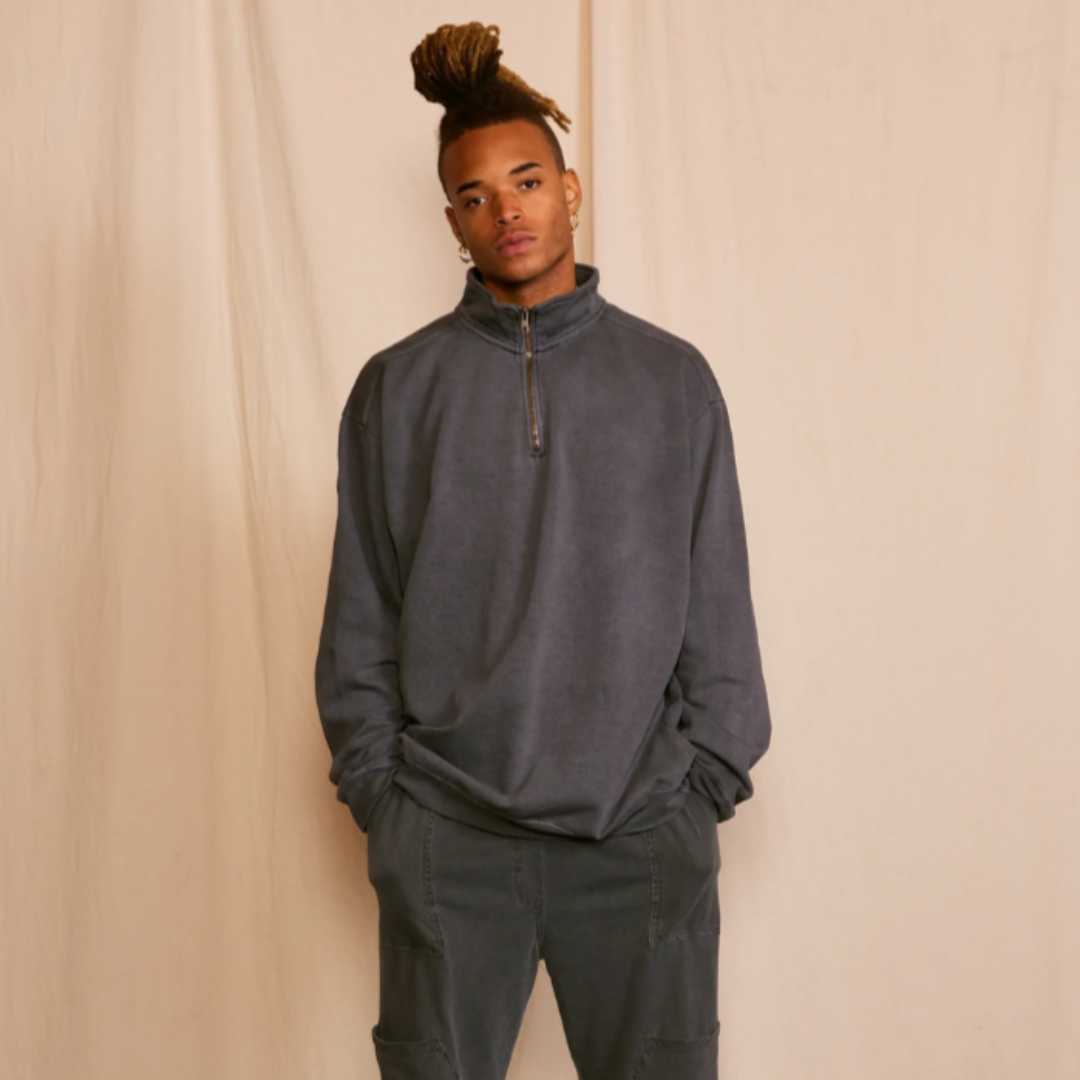 Model wearing Grateful Dead zip-up men’s sweatshirt, front view