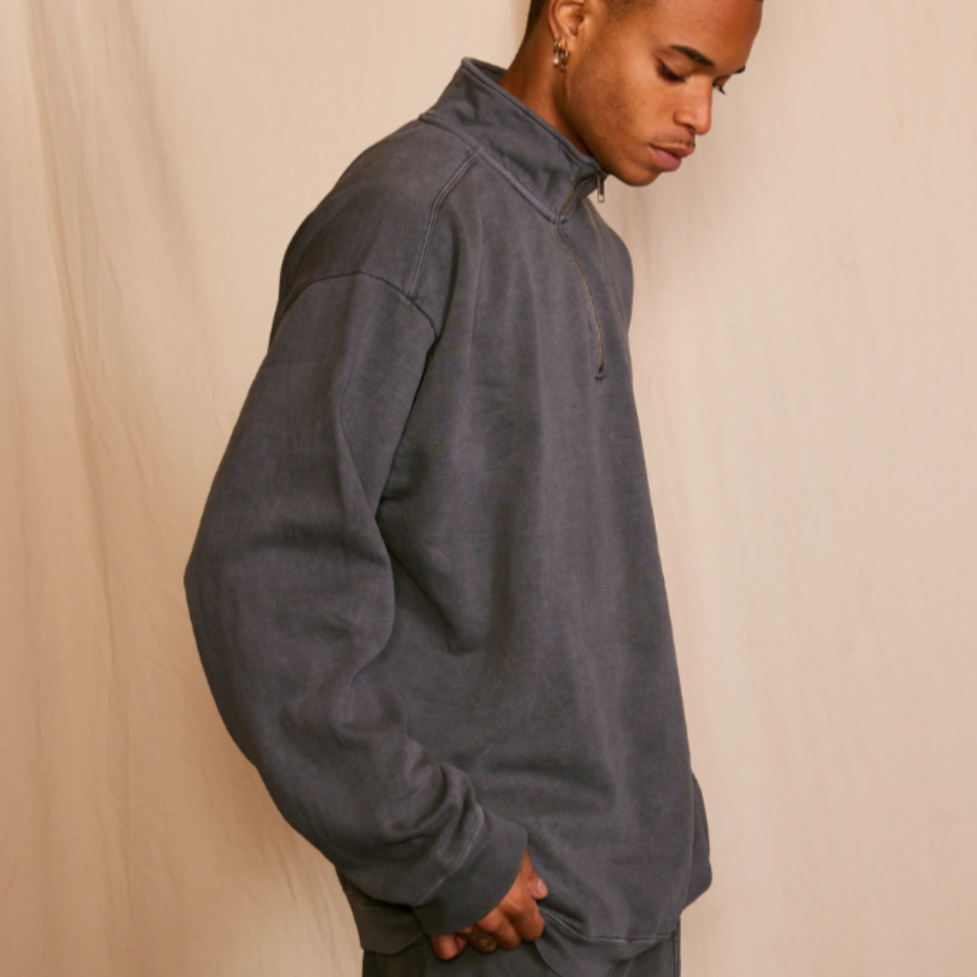 Side view of model wearing Grateful Dead zip-up men’s sweatshirt