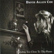 the album cover for David Allan Coe - Standing Too Close To the Flame