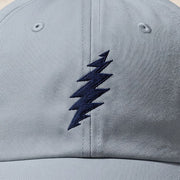 Close-up of the design on the Grateful Dead Embroidered Navy Bolt Dad Hat - Light Blue