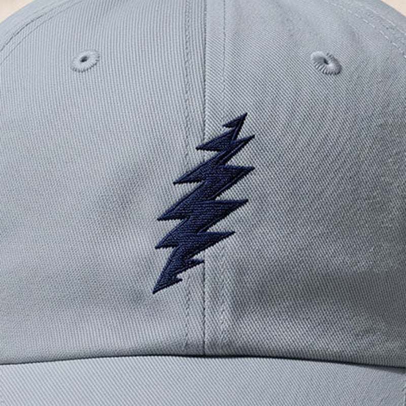 Close-up of the design on the Grateful Dead Embroidered Navy Bolt Dad Hat - Light Blue