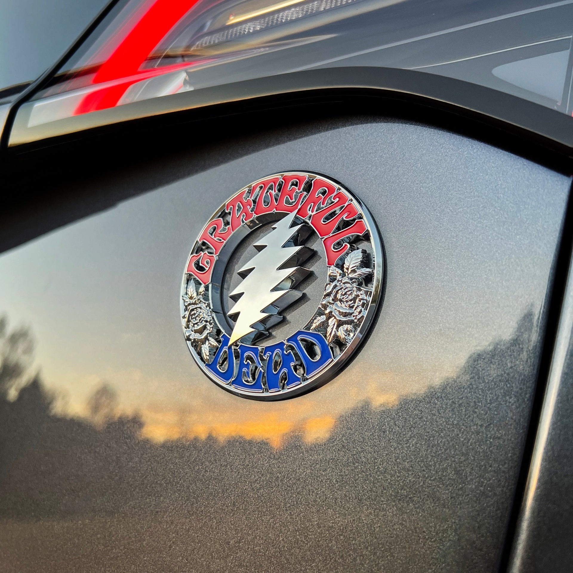 The Bolt & Roses Badge