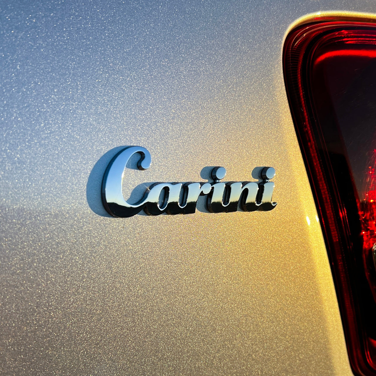 The Carini Badge