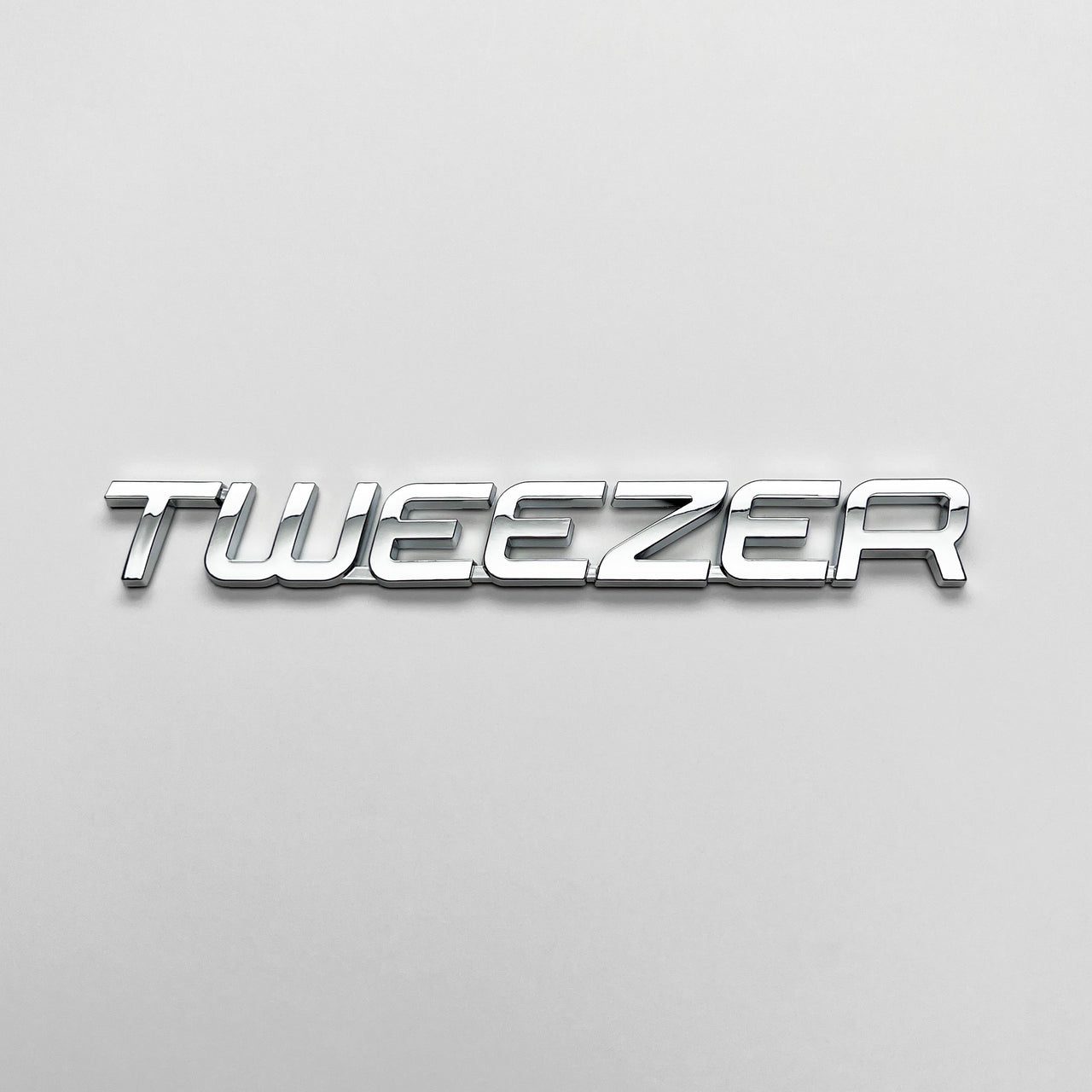 The Tweezer Badge