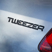 The Tweezer Badge