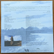 Back Cover: Iris DeMent – Infamous Angel: 30th Anniversary Vinyl LP | Relix