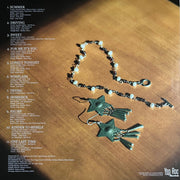 Back Cover: Jobi Riccio – Whiplash (Coke Bottle Clear LP Vinyl) Vinyl LP | Relix