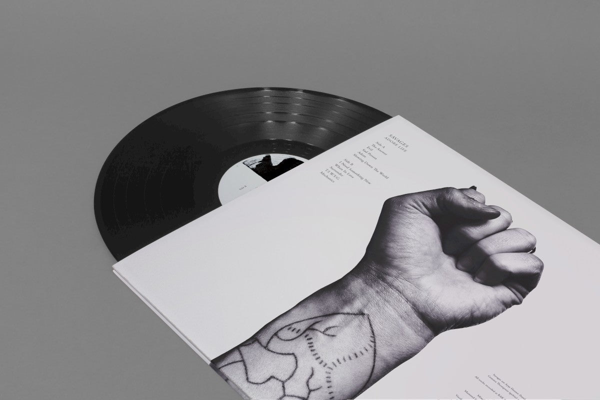 Back Cover: Savages – Adore Life Vinyl LP | Relix