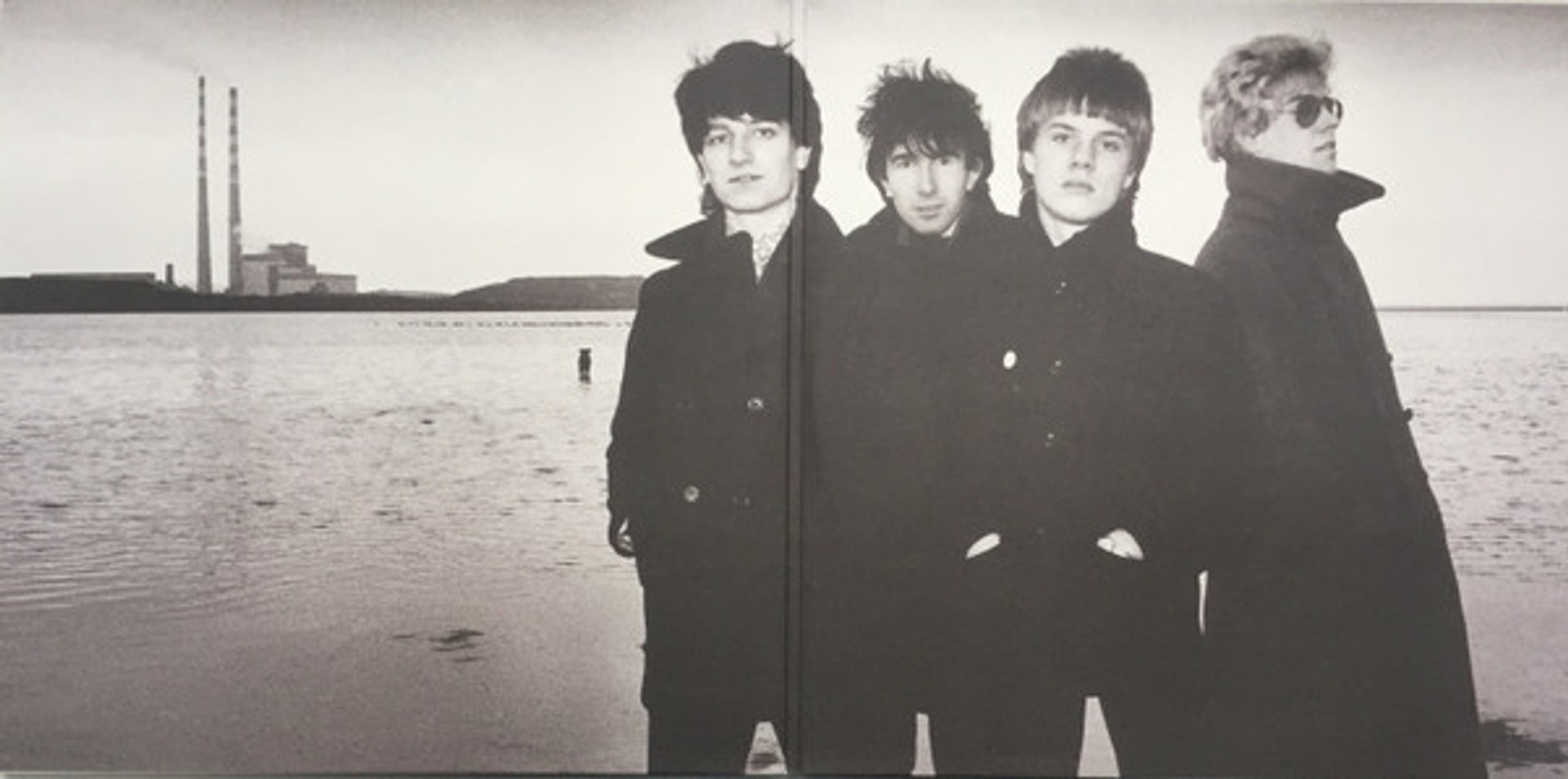 Back Cover: U2 – U218 Singles Vinyl LP | Relix