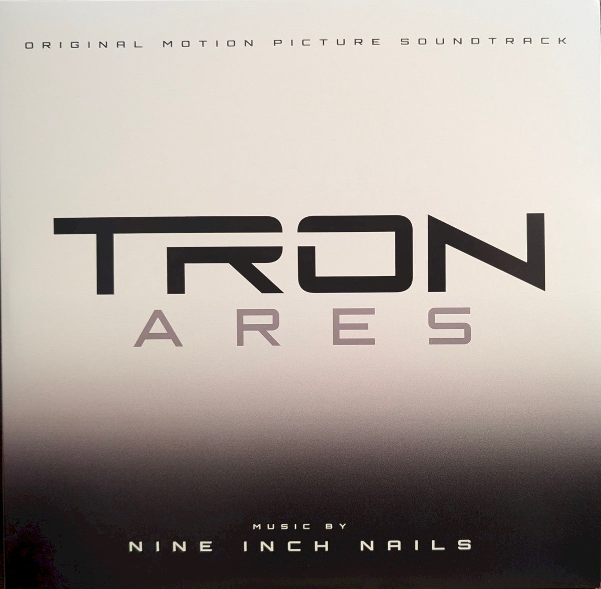 Front Cover: Nine Inch Nails – Tron: Ares (Original Soundtrack, Retail Exclusive Opaque White LP Vinyl) Vinyl LP | Relix