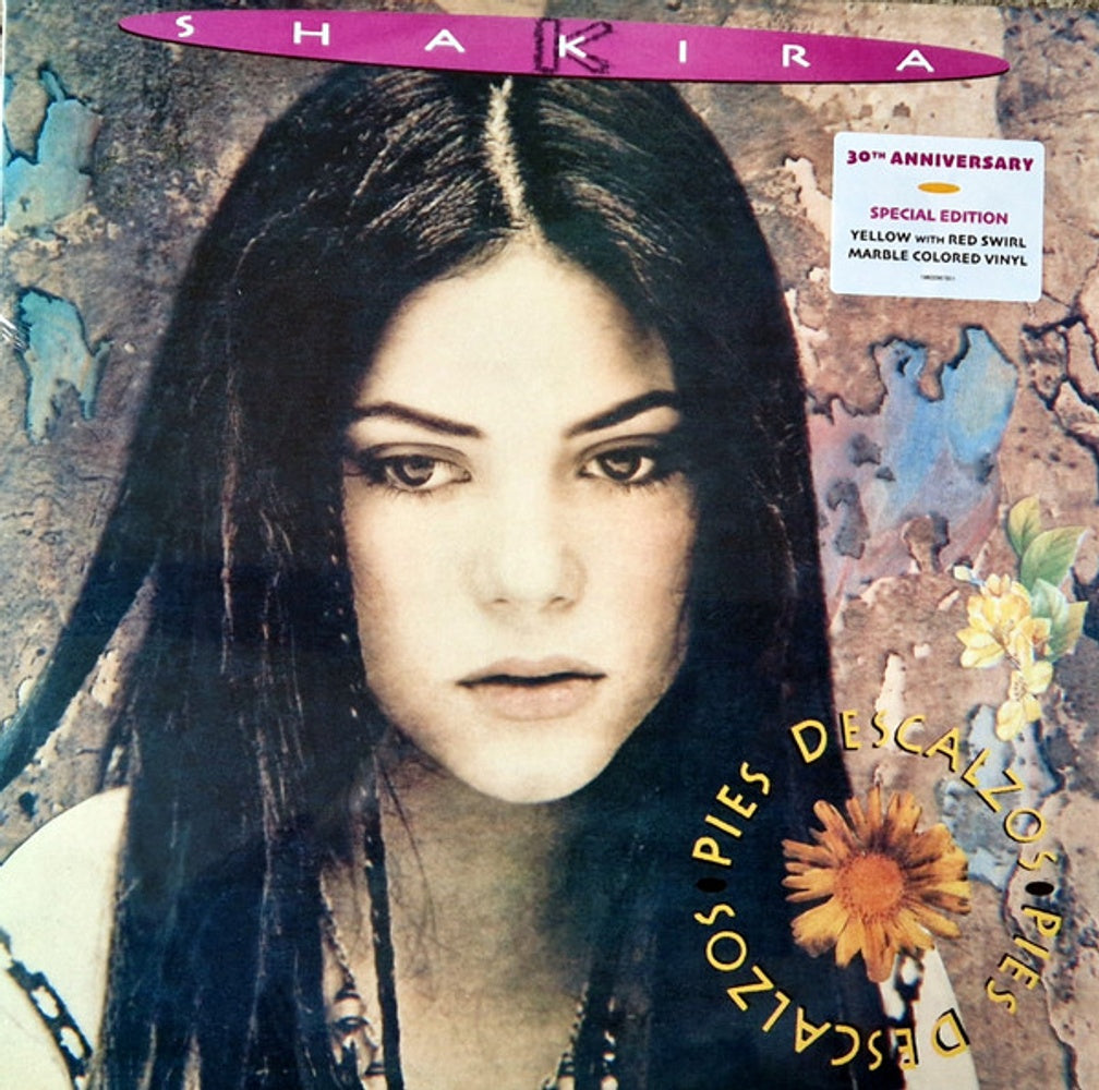 Front Cover: Shakira – Pies Descalzos (30th Anniversary, Yellow with Red Swirl Marble Colored LP Vinyl) Vinyl LP | Relix