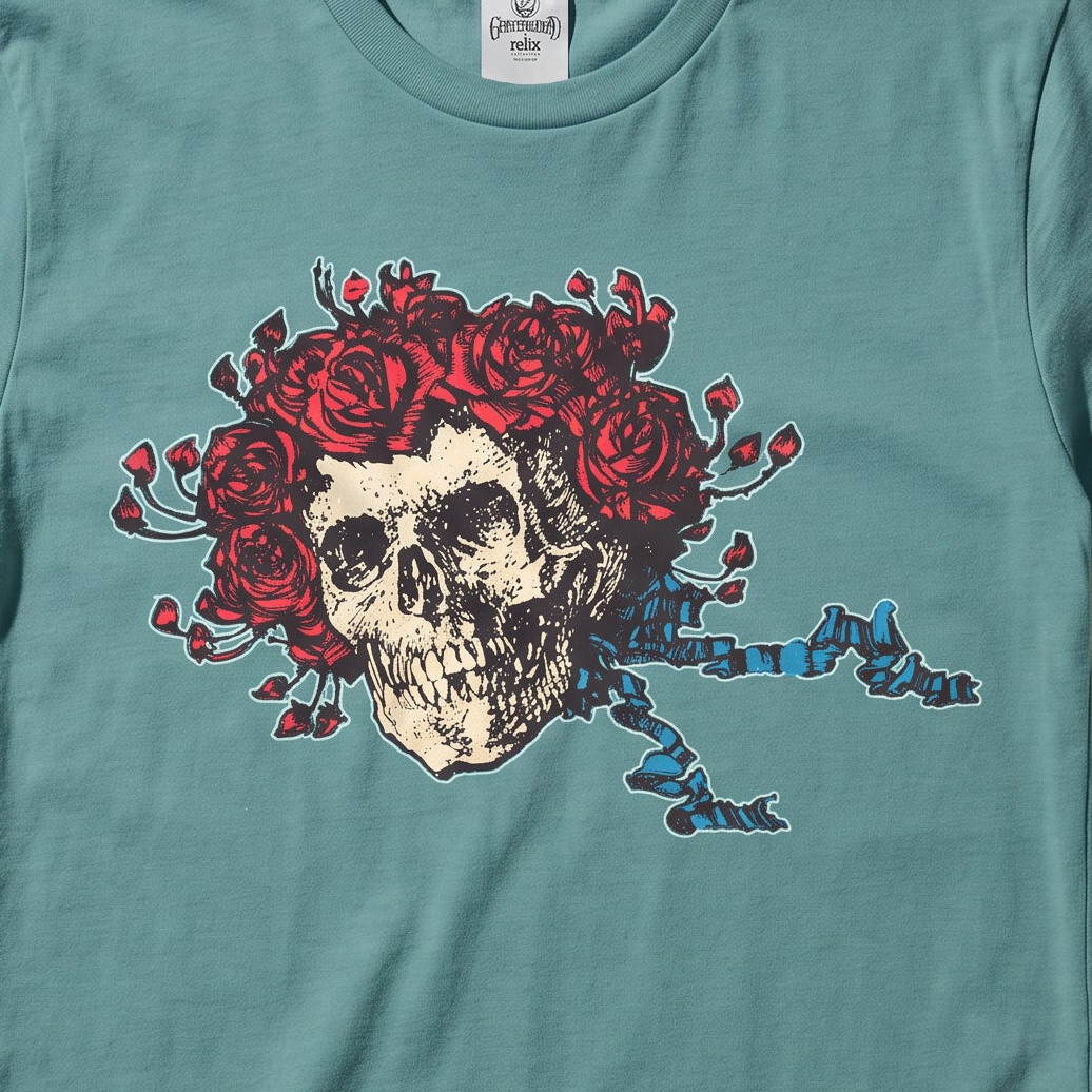 Close-up of the Bertha print on a sea foam t-shirt