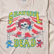Close-up of the Circus Comes to Town print on an ivory t-shirt