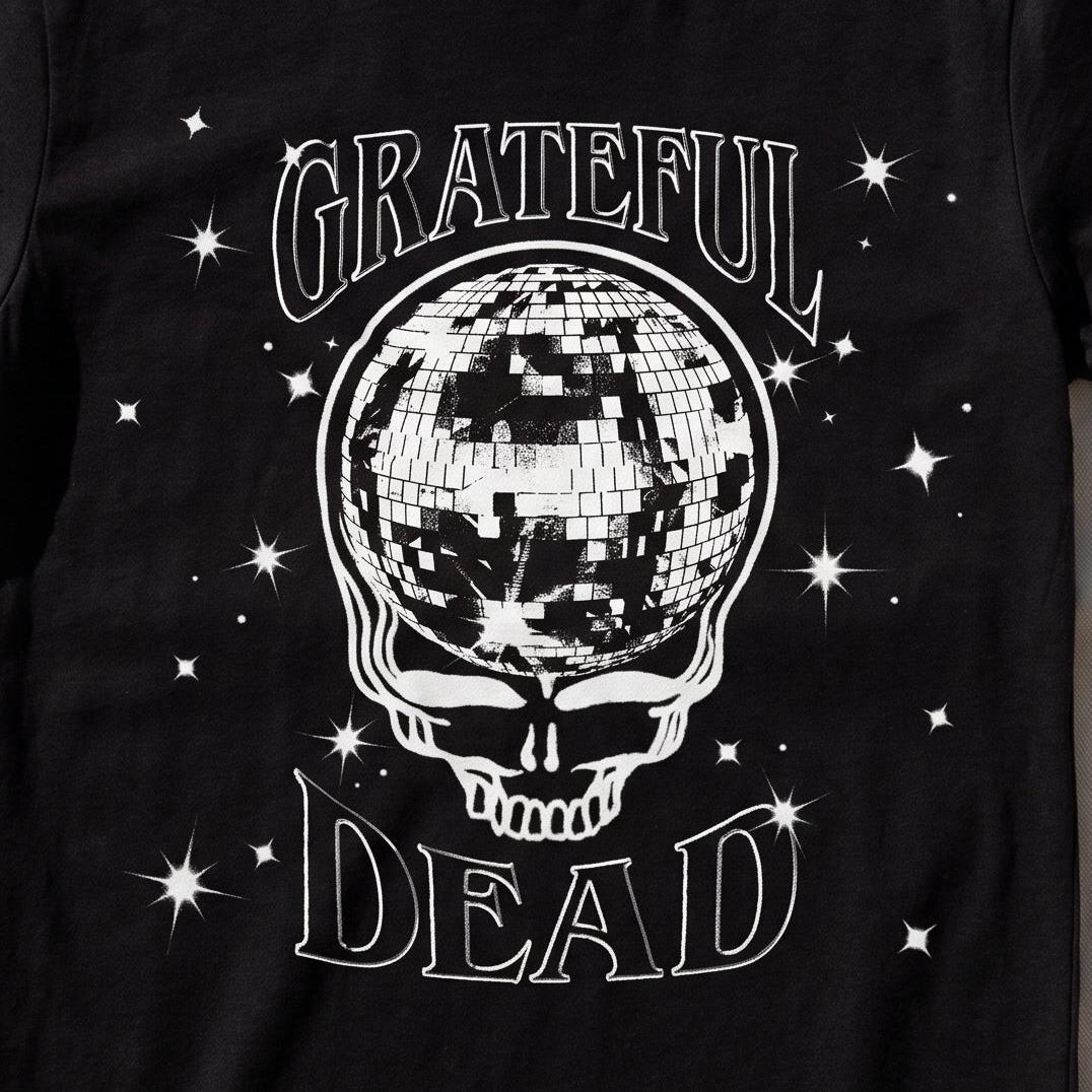 Close-up of the Disco Ball Stealie print on a black t-shirt