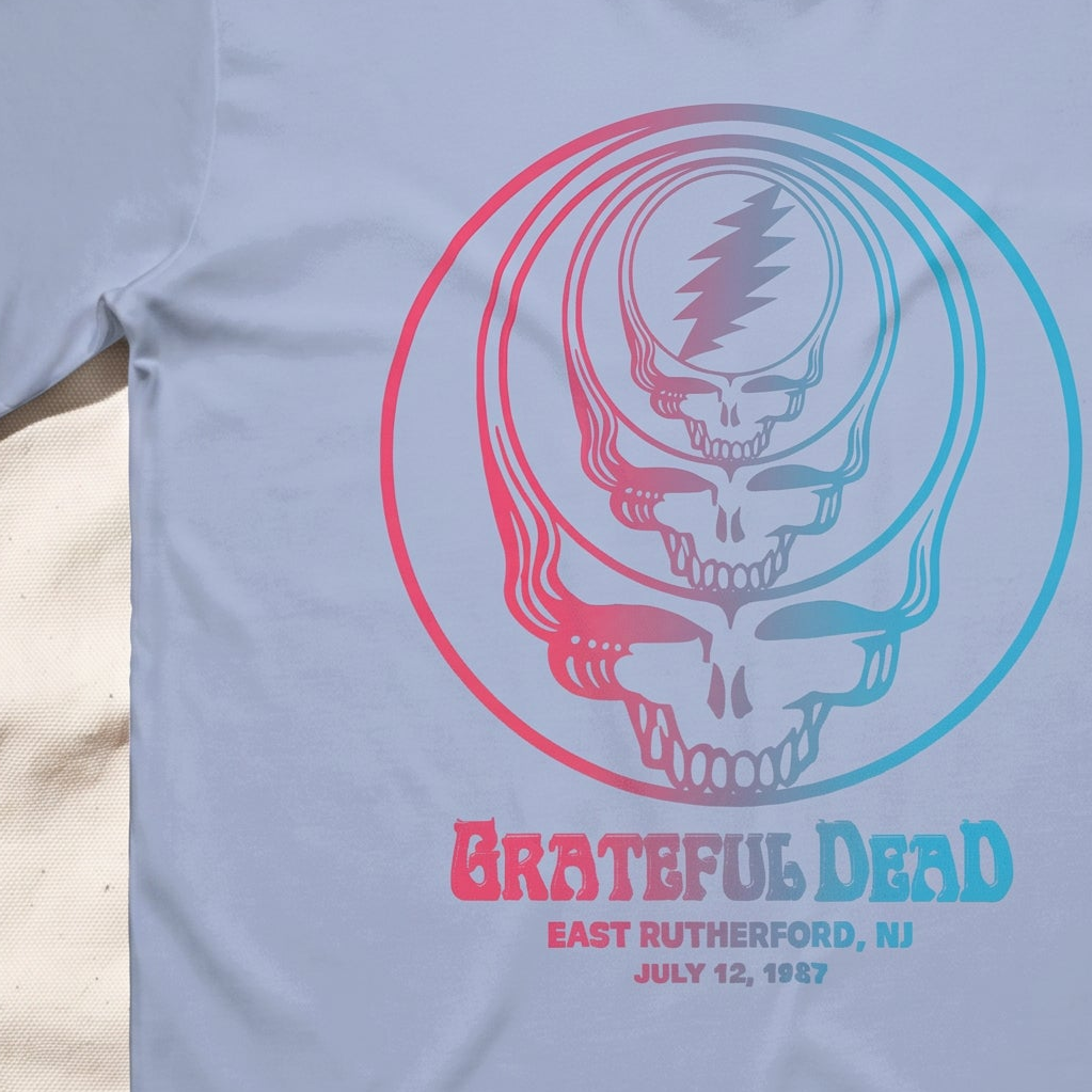 Close-up of the East Rutherford '87 print on a chambray t-shirt