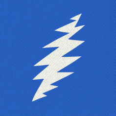 Close-up of the embroidered white bolt on a royal blue bucket hat