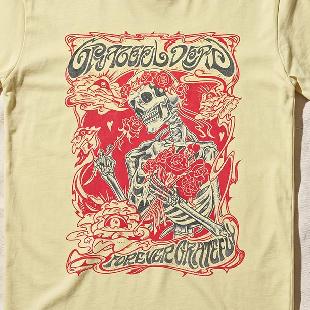 Close-up of the Forever Grateful print on a neon lemon t-shirt