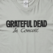 Close-up of the In Concert print on a bay t-shirt