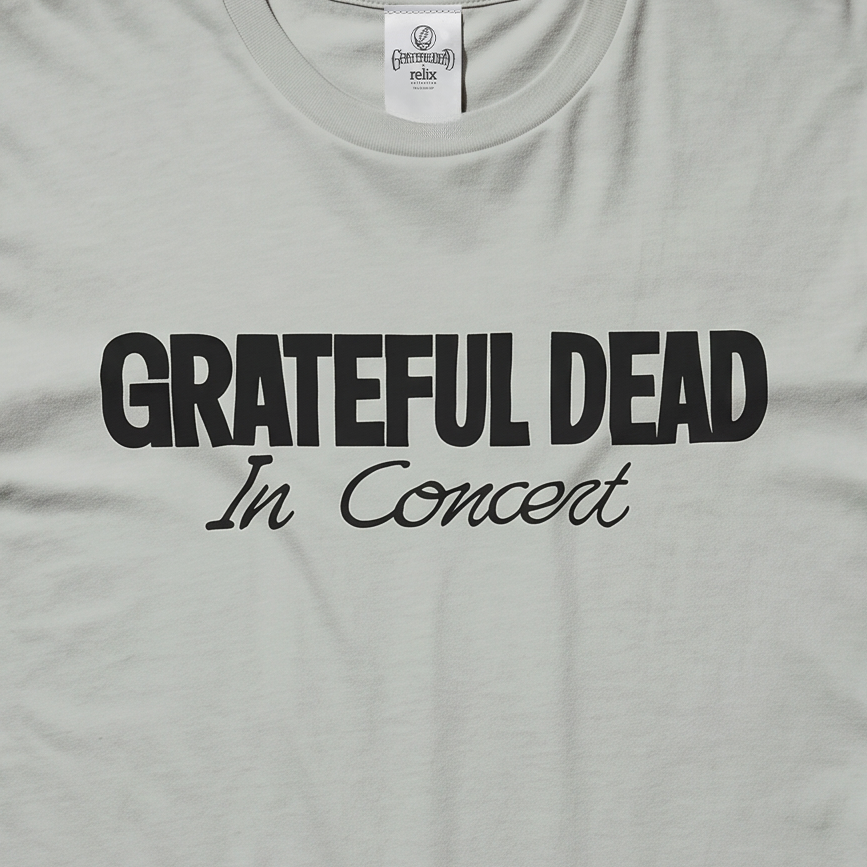Close-up of the In Concert print on a bay t-shirt