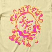 Close-up of the Liquid Chrome Stealie print on a neon lemon t-shirt