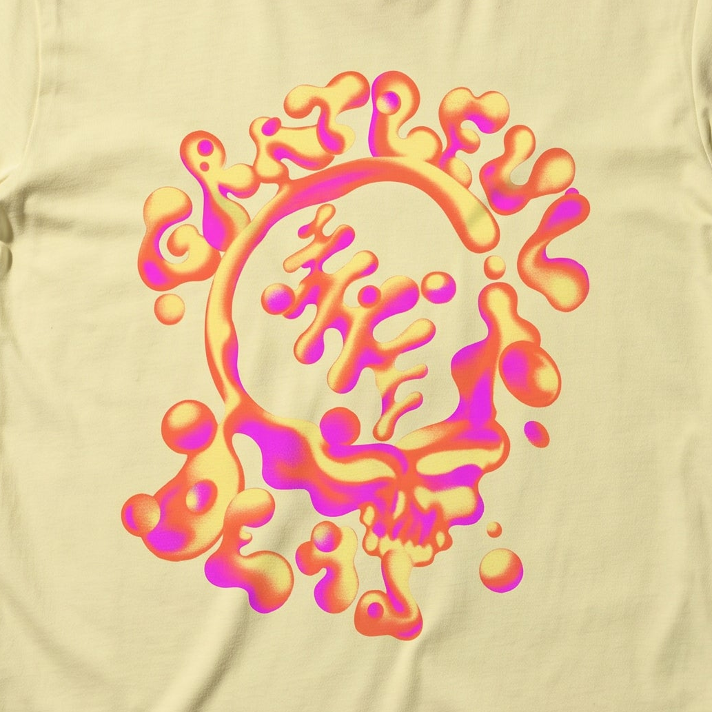 Close-up of the Liquid Chrome Stealie print on a neon lemon t-shirt