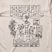 Close-up of the Olympic Tour Games print on an ivory t-shirt