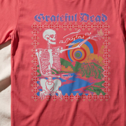 Close-up of the Riverside Serenade print on a paprika t-shirt