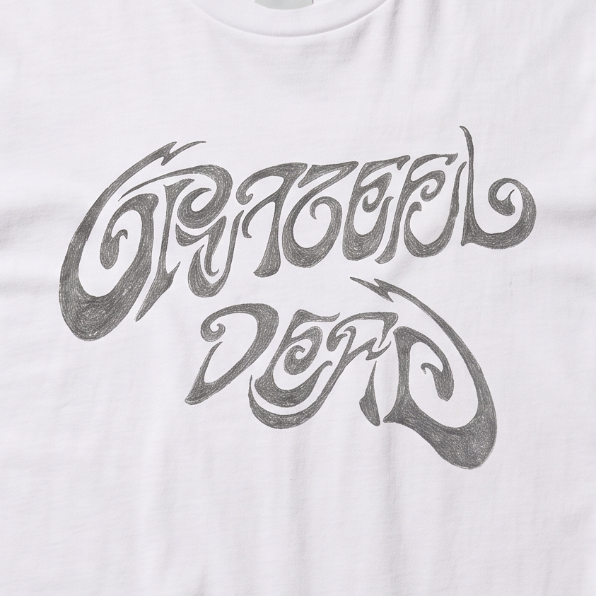 Close-up of the Scribble Wordmark print on a white t-shirt