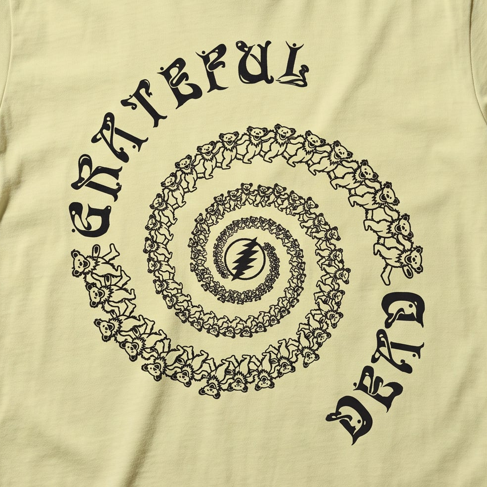 Close-up of the Spiraling Out print on a neon lemon t-shirt