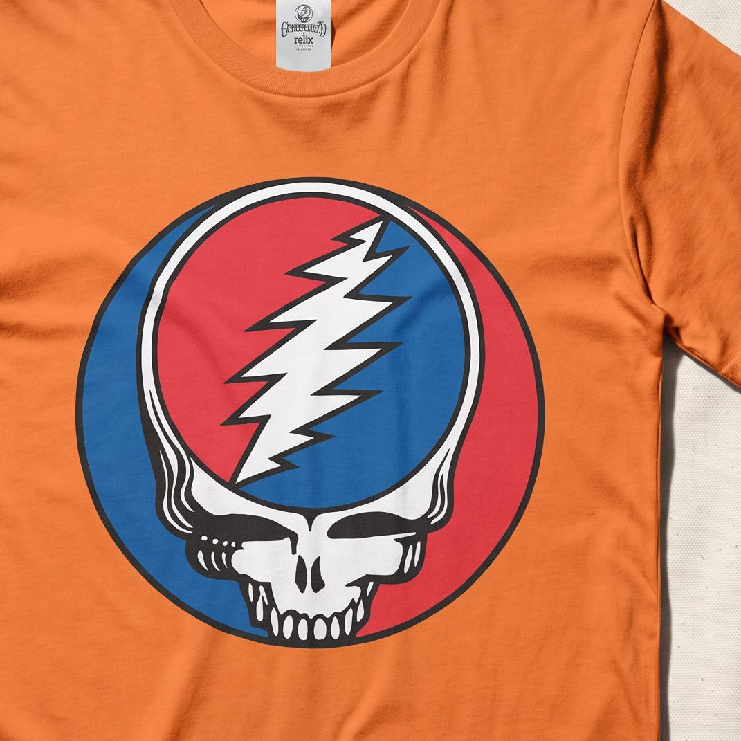 Close-up of the Steal Your Face print on a burnt orange t-shirt