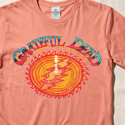 Close-up of the Sunshine Stealie print on a neon red orange t-shirt