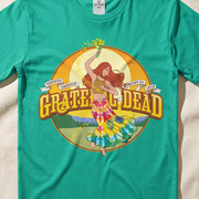 Close-up of the Veneta, Oregon 8/27/72 print on an island green t-shirt