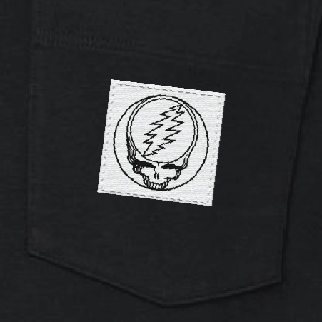 Close-up of the woven Stealie label on the pocket of a black long-sleeve t-shirt