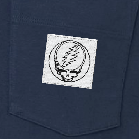 Close-up of the woven Stealie label on the pocket of a sea blue long-sleeve t-shirt