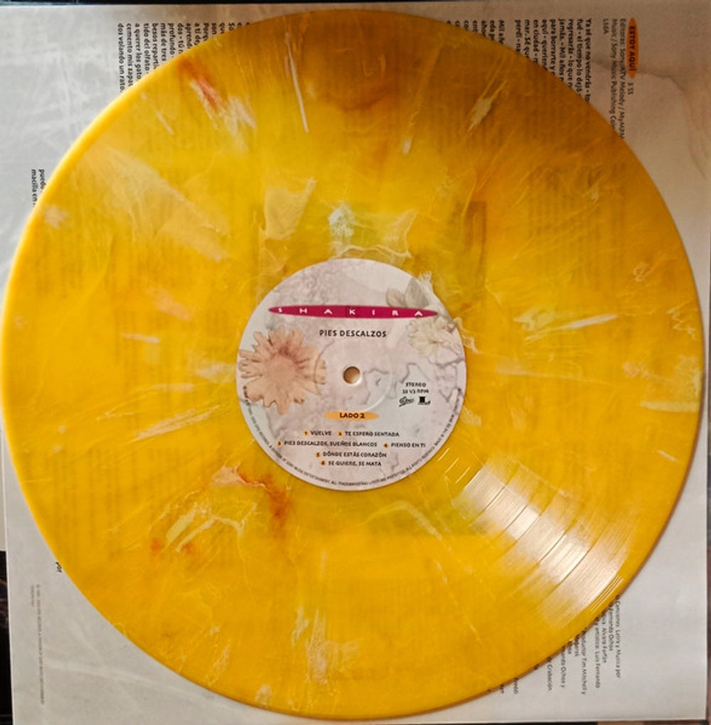 Image 2: Shakira – Pies Descalzos (30th Anniversary, Yellow with Red Swirl Marble Colored LP Vinyl) Vinyl LP | Relix