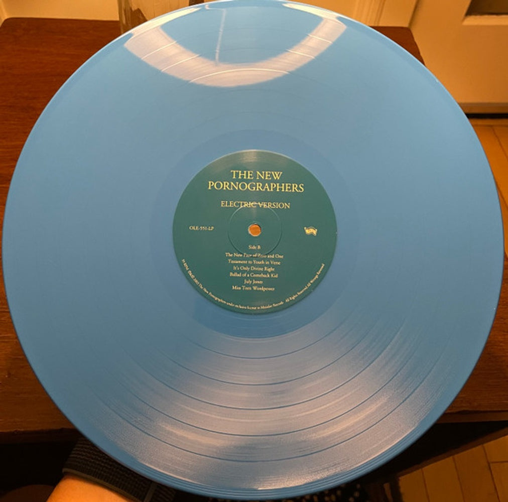 Image: New Pornographers – Electric Version (Blue, Clear LP Vinyl) Vinyl LP | Relix