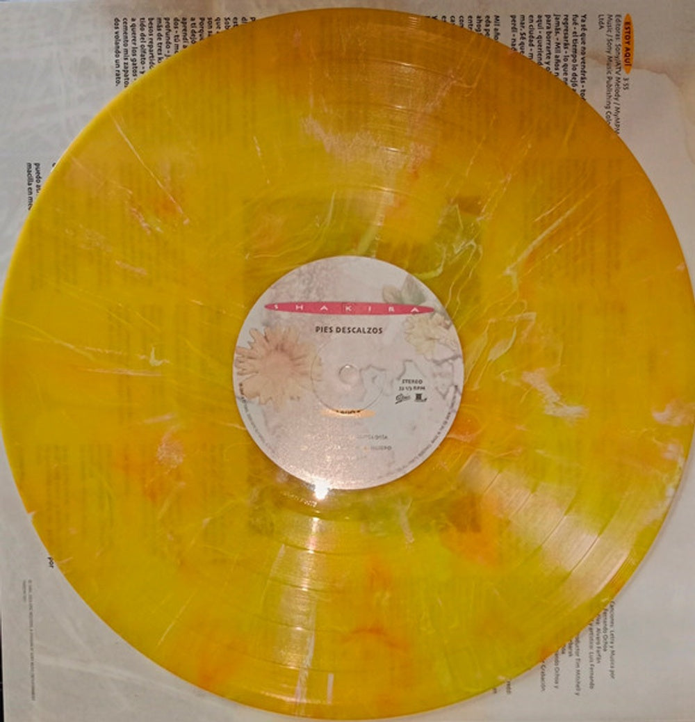 Image: Shakira – Pies Descalzos (30th Anniversary, Yellow with Red Swirl Marble Colored LP Vinyl) Vinyl LP | Relix