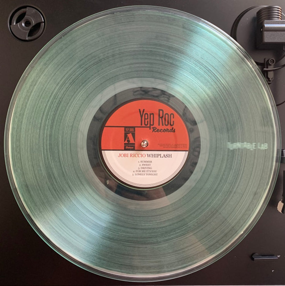 Label Disc: Jobi Riccio – Whiplash (Coke Bottle Clear LP Vinyl) Vinyl LP | Relix