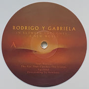 Label Disc: Rodrigo Y Gabriela – In Between Thoughts…A New World (Bone LP Vinyl) Vinyl LP | Relix