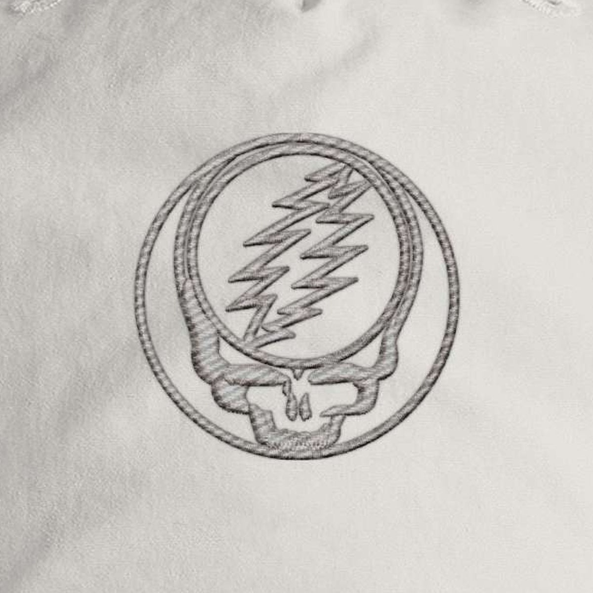 Close-up of the design on the Grateful Dead Embroidered Stealie Surf Rope Cap - Off-White