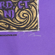 Close-up of artist signatures and vibrant artwork on The Dead’s 2009 New York concert poster