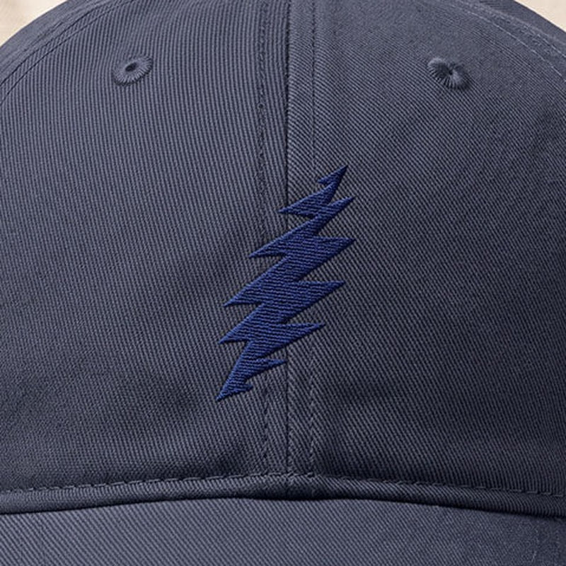 Close-up of the design on the Grateful Dead Embroidered Navy Bolt Dad Hat - Vintage Navy