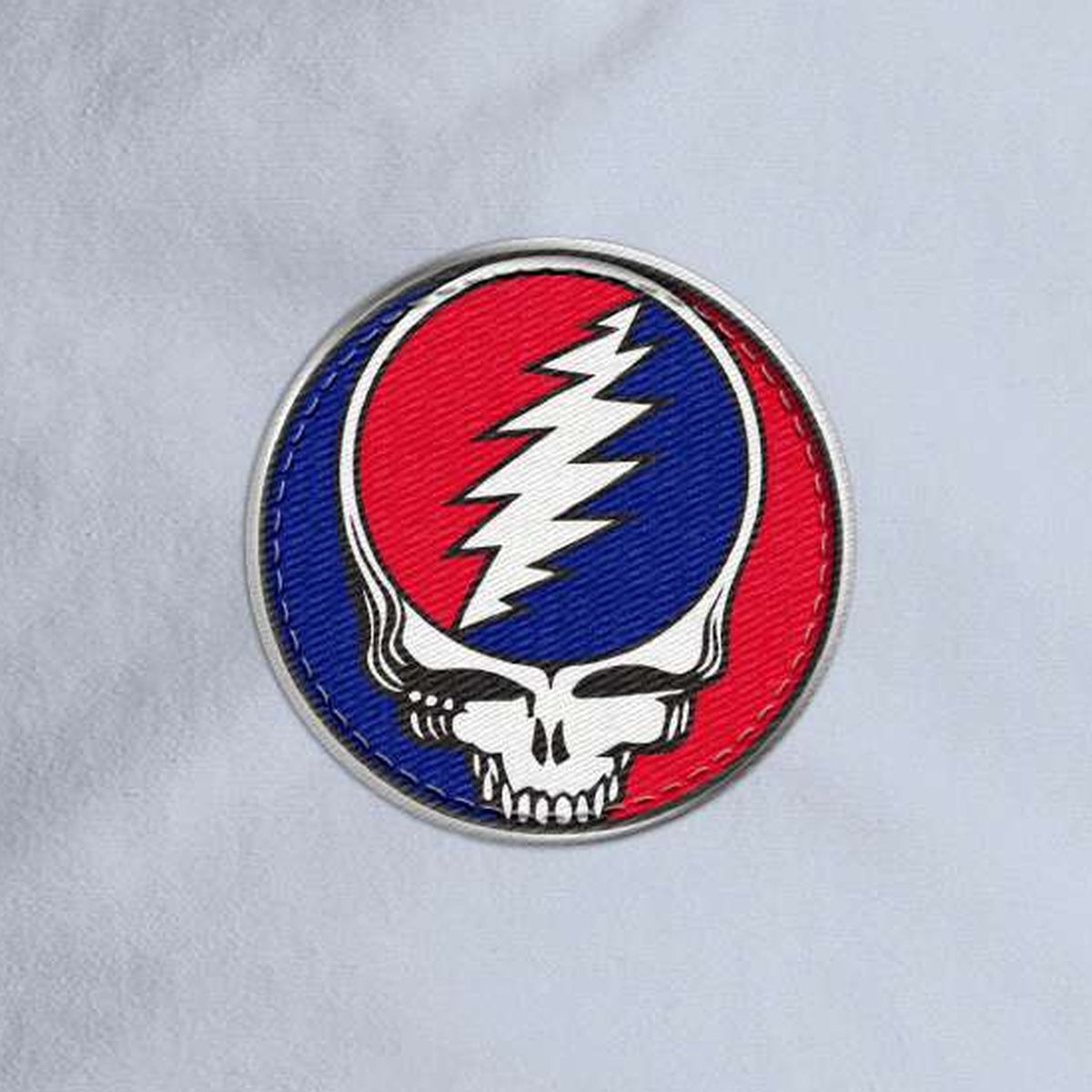 Close-up of the design on the Grateful Dead Embroidered Stealie Surf Rope Cap - Powder Blue