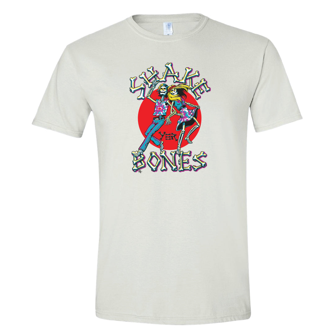 Shake Yer Bones throwback t-shirt front view featuring vintage-style skeleton dancing graphic on navy tee